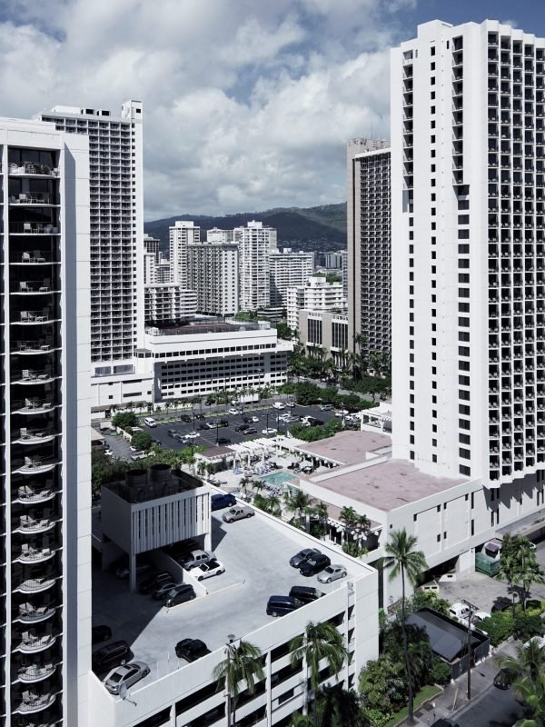 A beautiful aerial shot of the city with tall buildings and beautiful cloudy sky